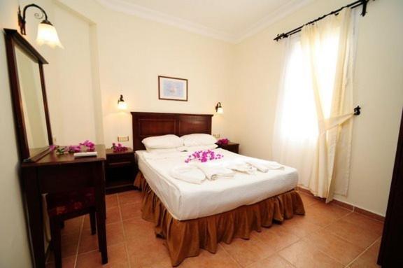 Caretta Apart Fethiye Rum bild